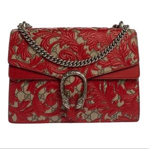 GUCCI Medium GG Supreme Arabesque Dionysus bag in red